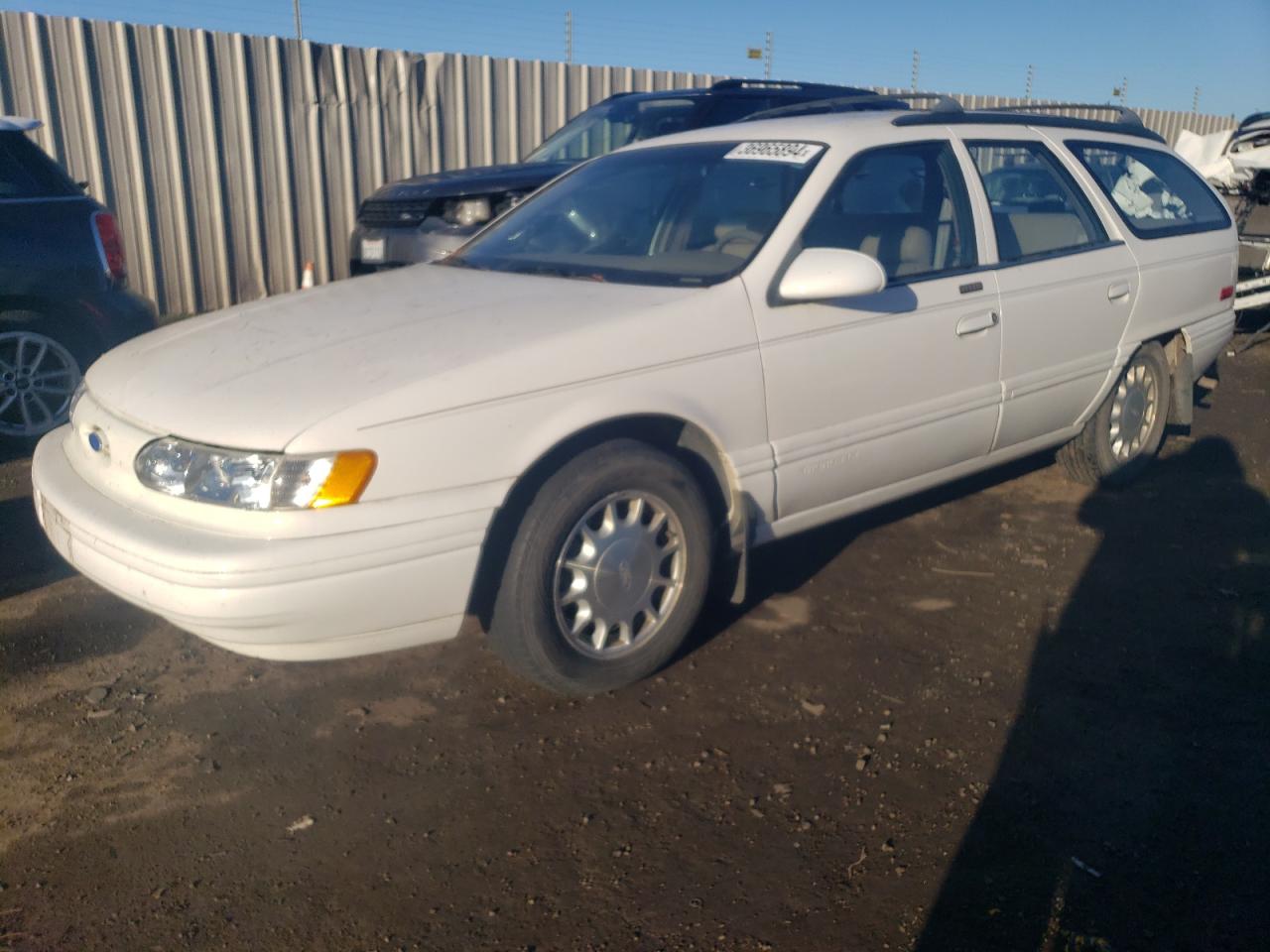 1994 Ford Taurus Lx VIN: 1FALP5841RG127511 Lot: 36965894