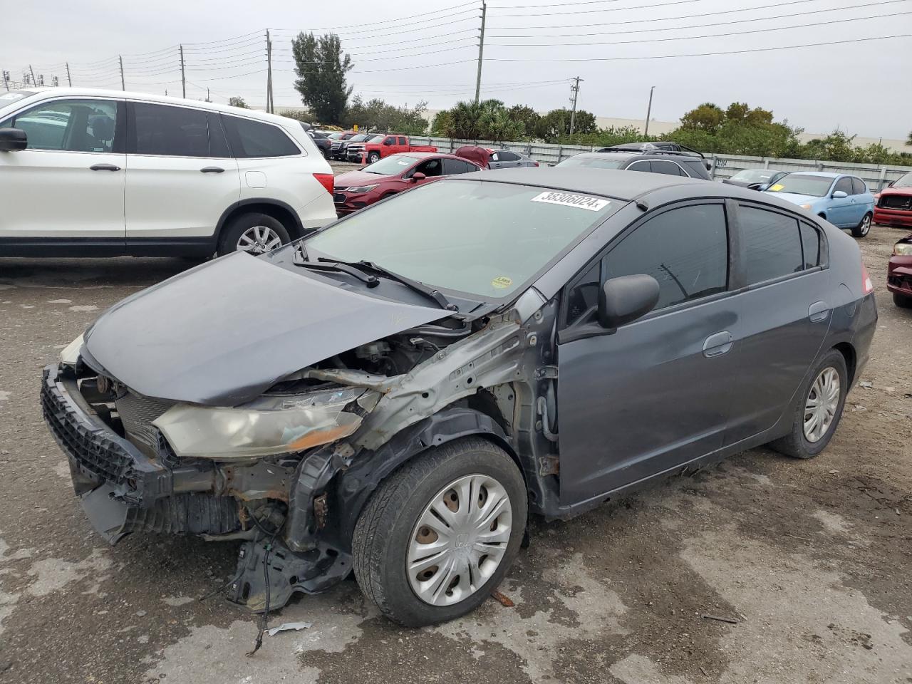 2010 Honda Insight Lx VIN: JHMZE2H54AS032023 Lot: 38306024