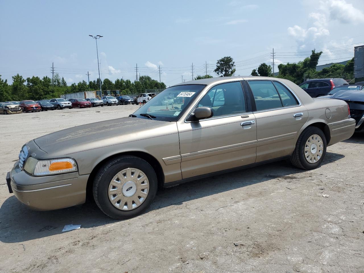 2003 Ford Crown Victoria VIN: 2FAFP73WX3X165953 Lot: 64753464