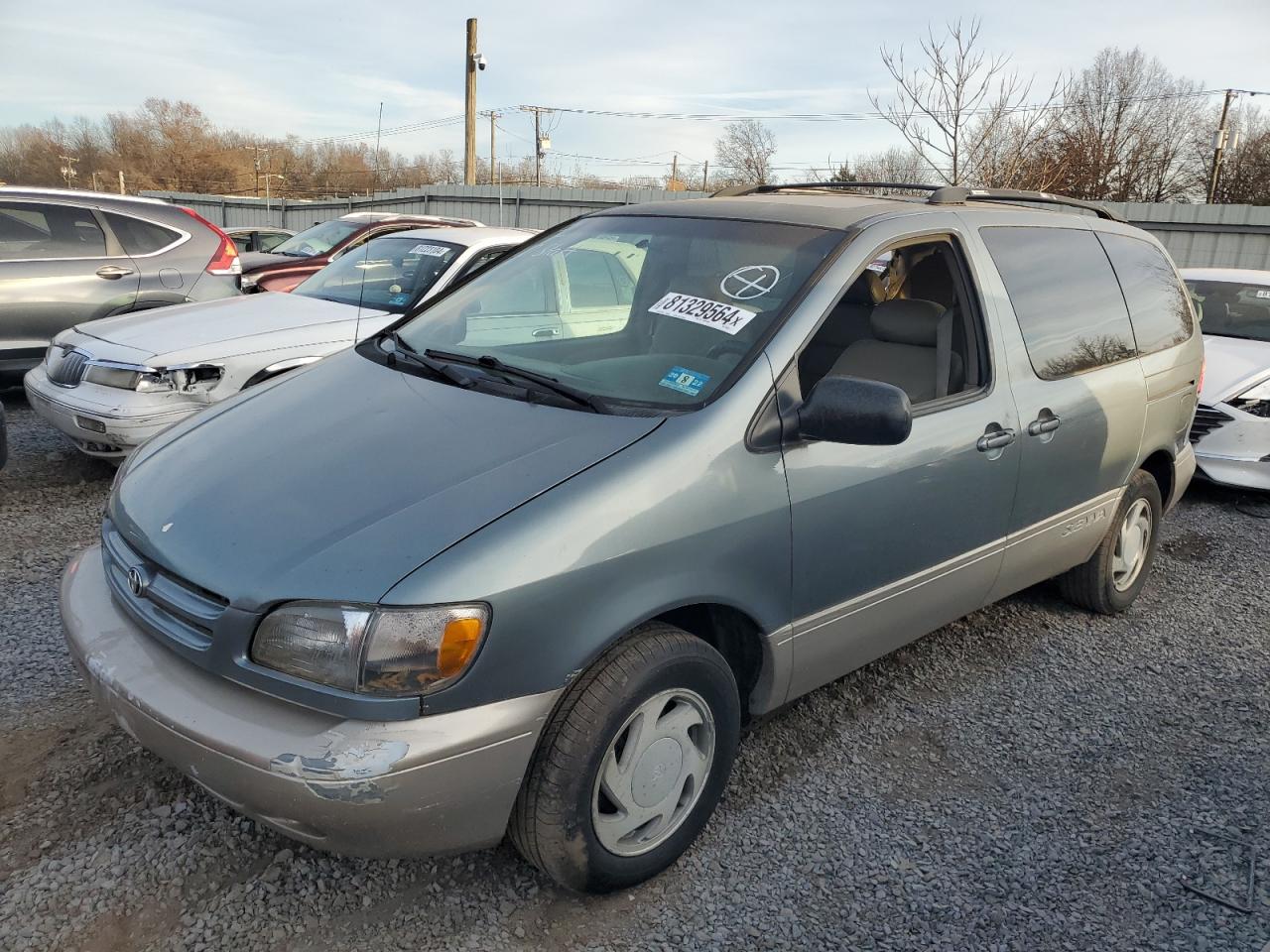 1999 Toyota Sienna Le VIN: 4T3ZF13C2XU106215 Lot: 81329564