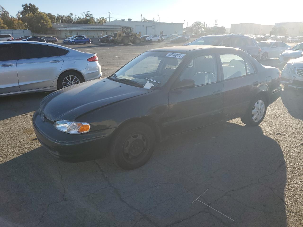 1999 Chevrolet Geo Prizm Base VIN: 1Y1SK5289XZ411868 Lot: 79348064