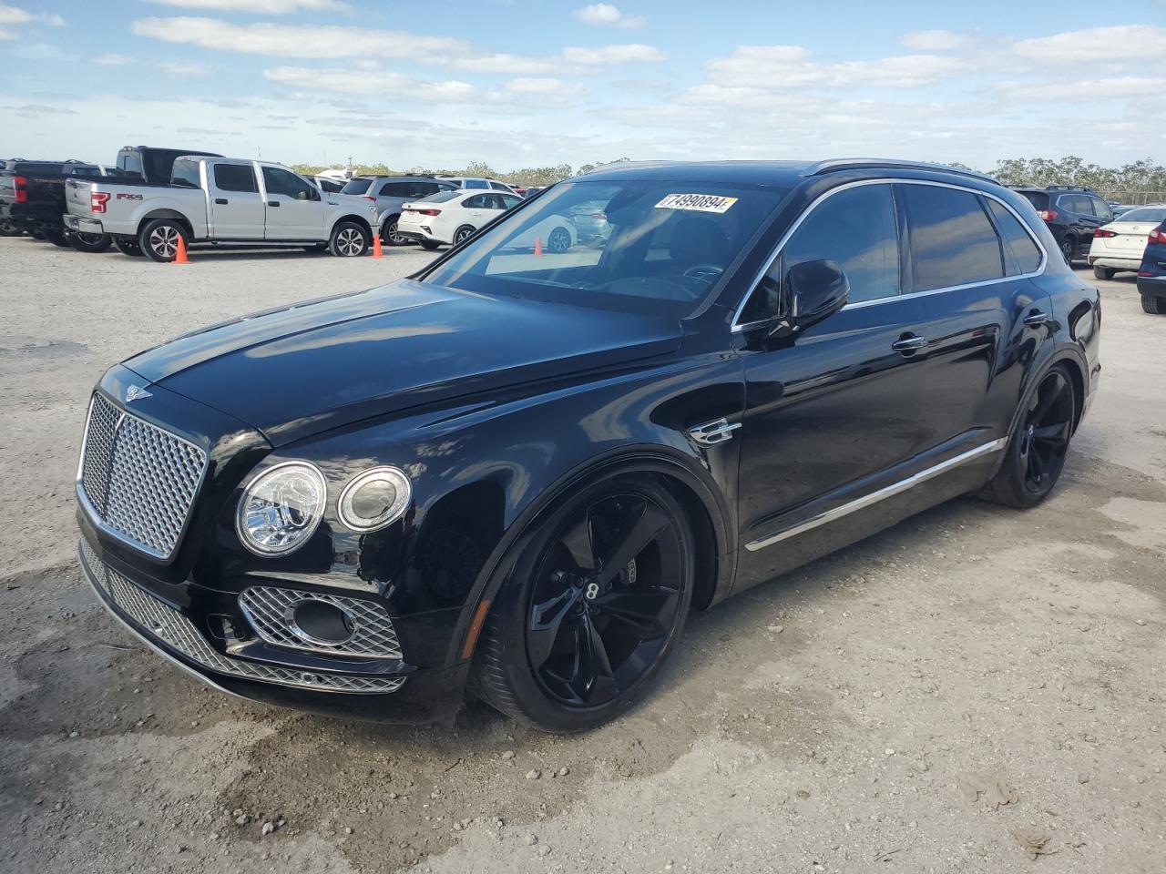 2018 Bentley Bentayga VIN: SJAAC2ZV9JC018049 Lot: 74990894