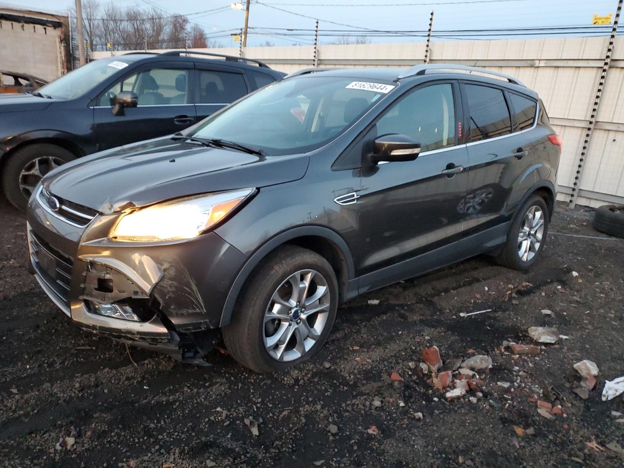 2016 Ford Escape Titanium VIN: 1FMCU9J95GUC71721 Lot: 81629644