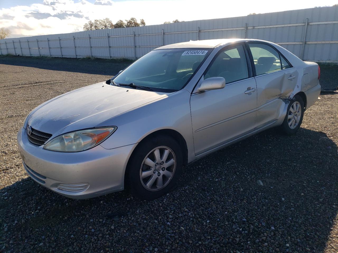 2003 Toyota Camry Le VIN: 4T1BF30K93U557105 Lot: 82450474