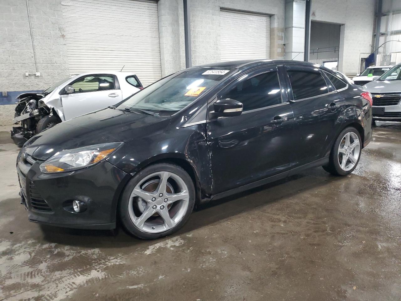 2013 Ford Focus Titanium VIN: 1FADP3J23DL352613 Lot: 82641554