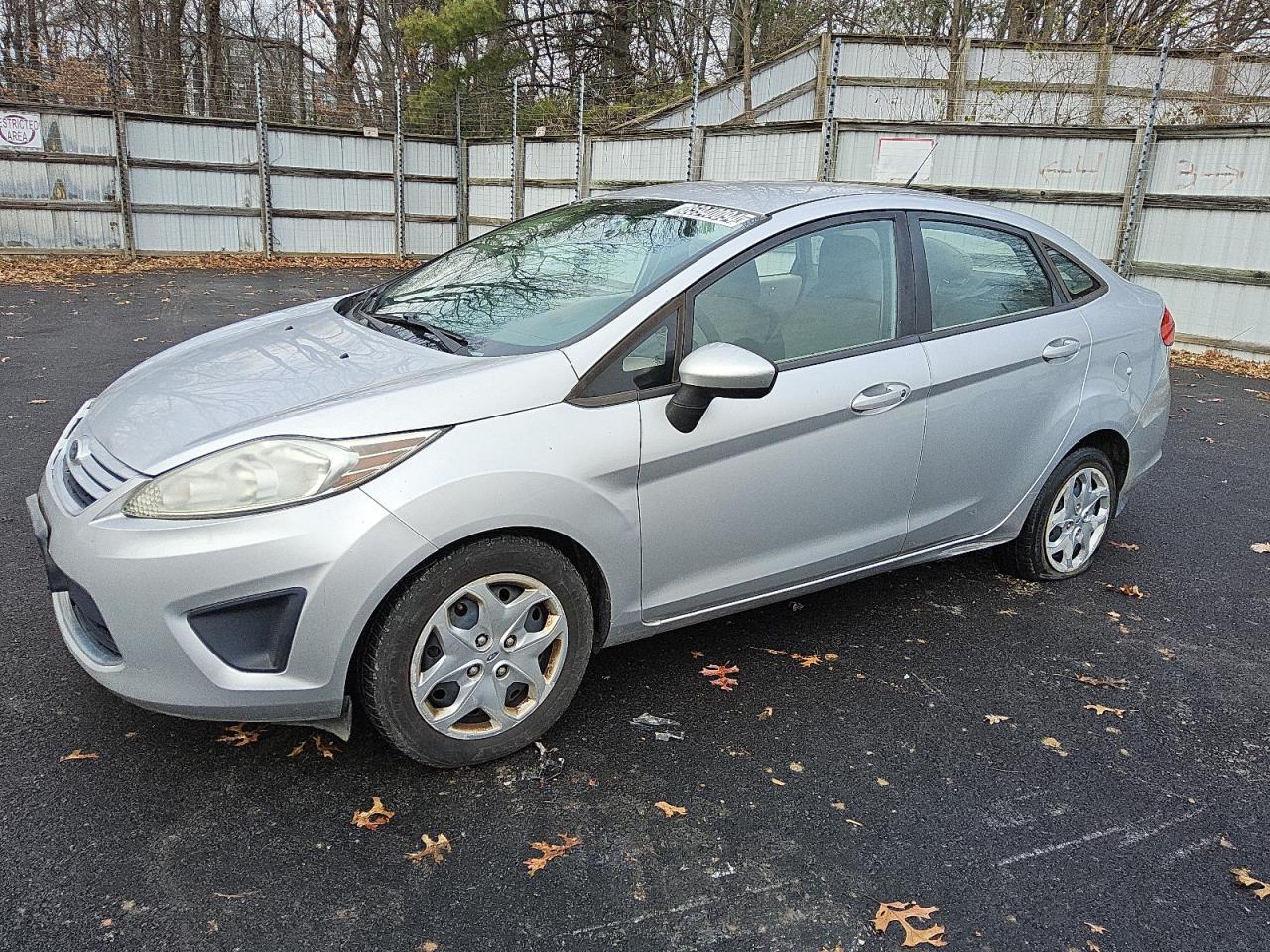 2011 Ford Fiesta S VIN: 3FADP4AJ7BM166713 Lot: 85940094