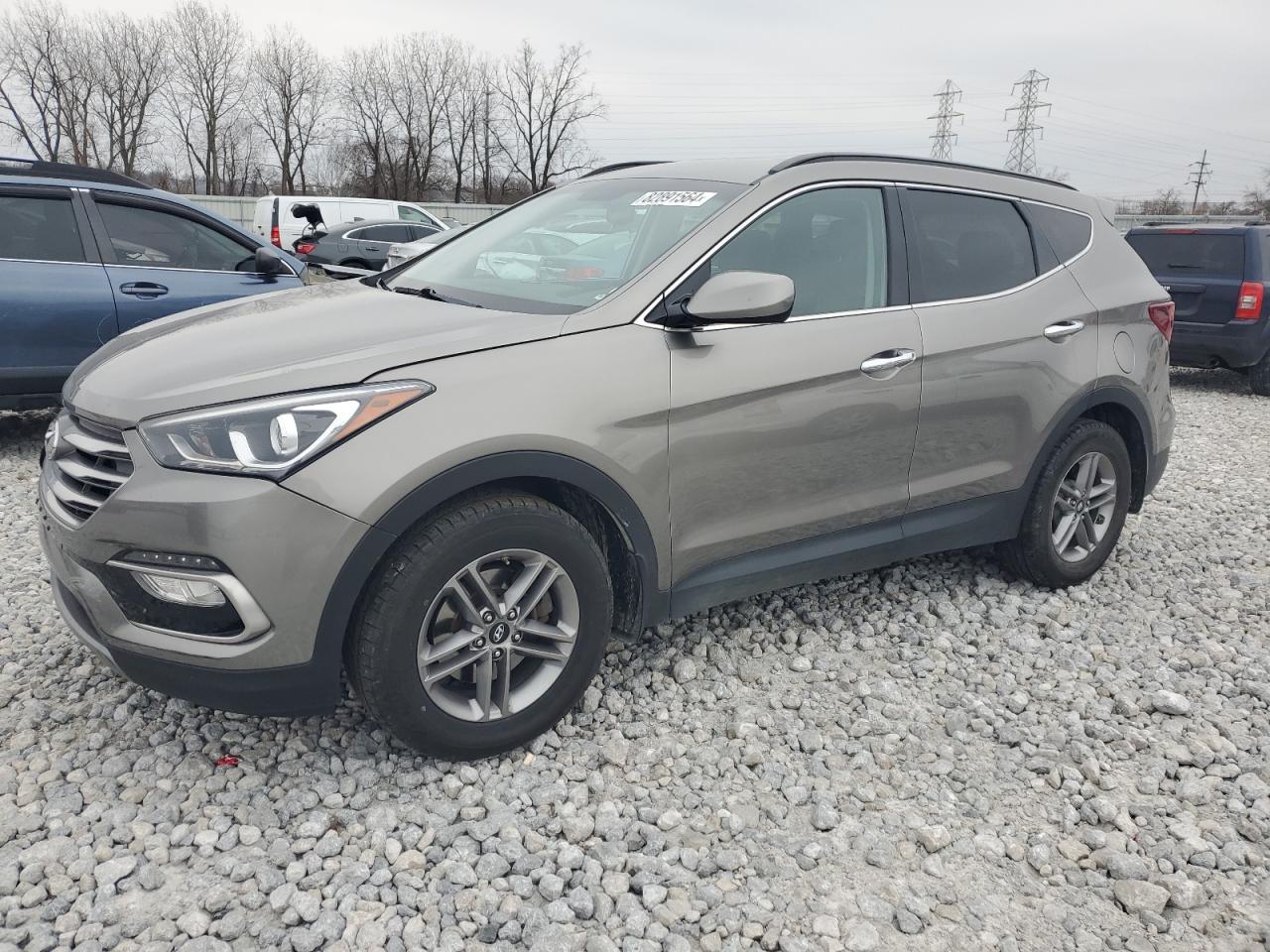 2017 Hyundai Santa Fe VIN: 5XYZUDLB5HG427664 Lot: 82891564