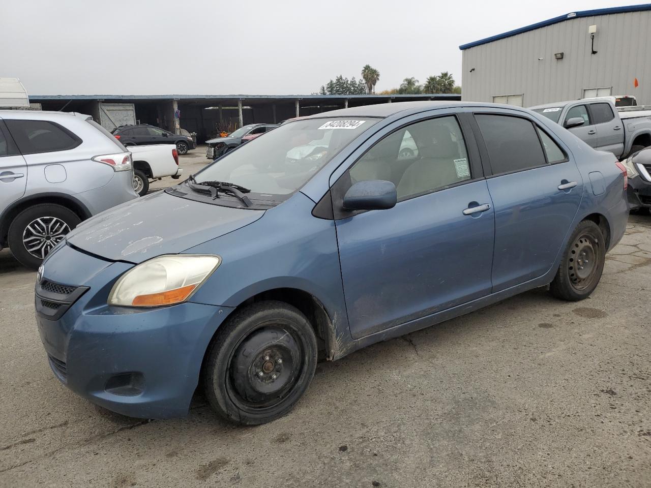 2009 Toyota Yaris VIN: JTDBT903991326921 Lot: 84208294