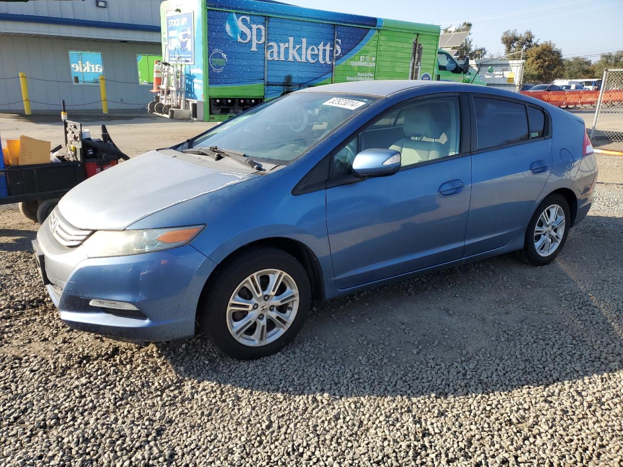 2010 Honda Insight Ex VIN: JHMZE2H77AS024404 Lot: 82923014