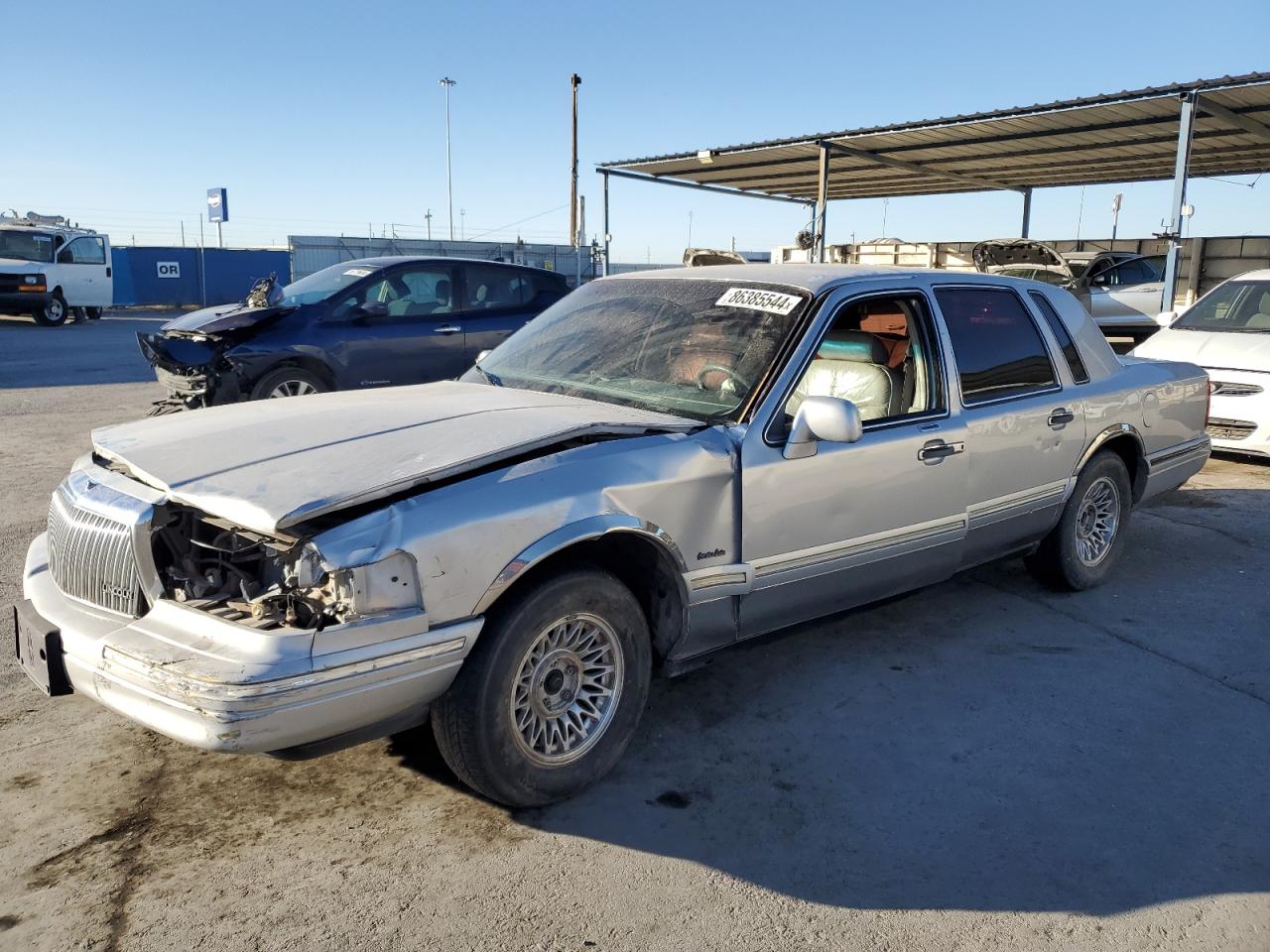 1997 Lincoln Town Car Executive VIN: 1LNLM81W3VY669872 Lot: 86385544