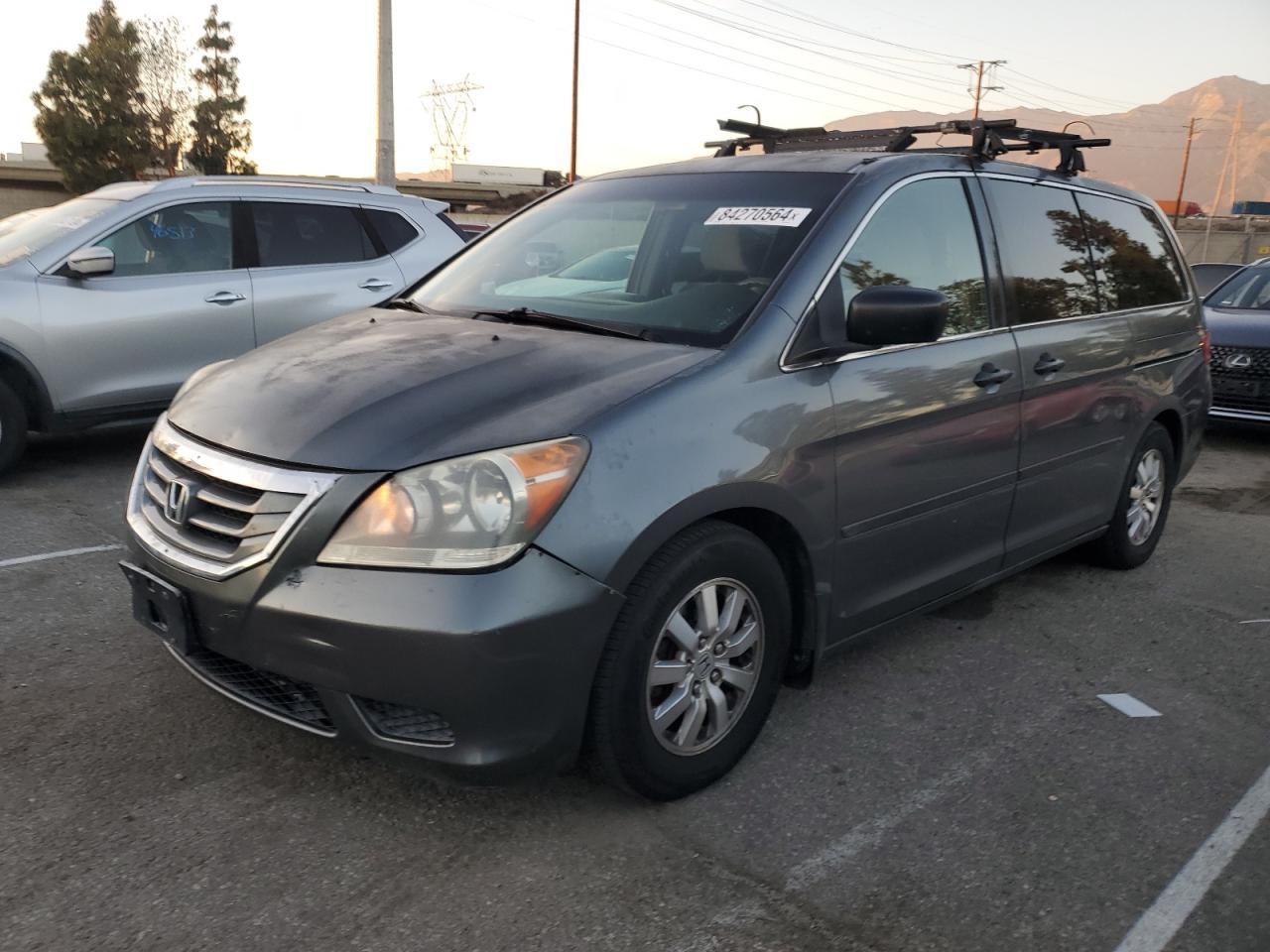 2010 Honda Odyssey Lx VIN: 5FNRL3H29AB099541 Lot: 84270564