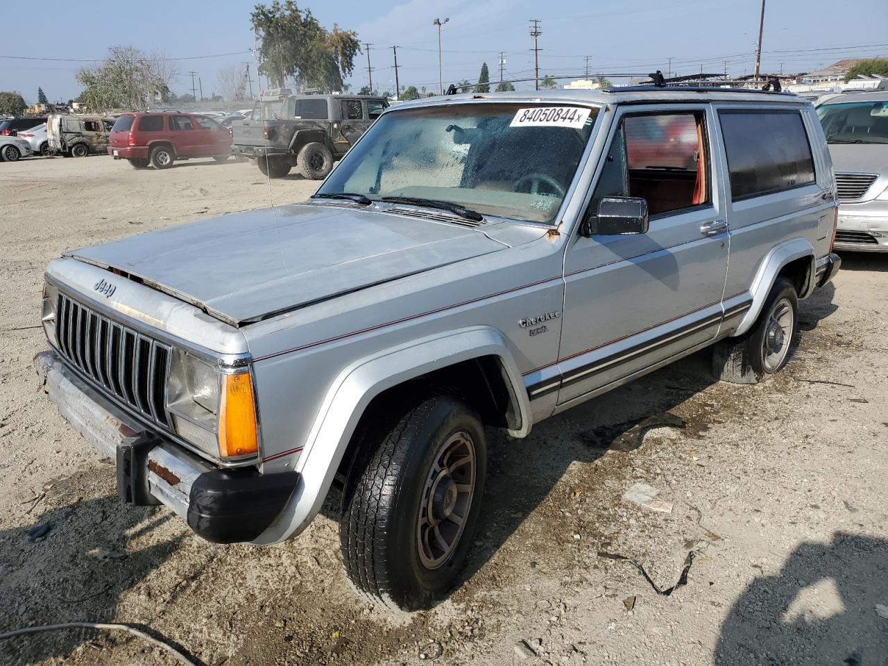 1985 Jeep Cherokee Laredo VIN: 1JCWB7742FT144063 Lot: 84050844