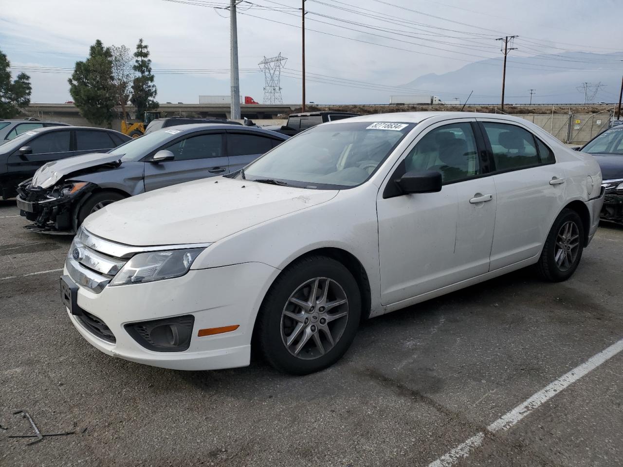 2011 Ford Fusion S VIN: 3FAHP0GA2BR293258 Lot: 82718634