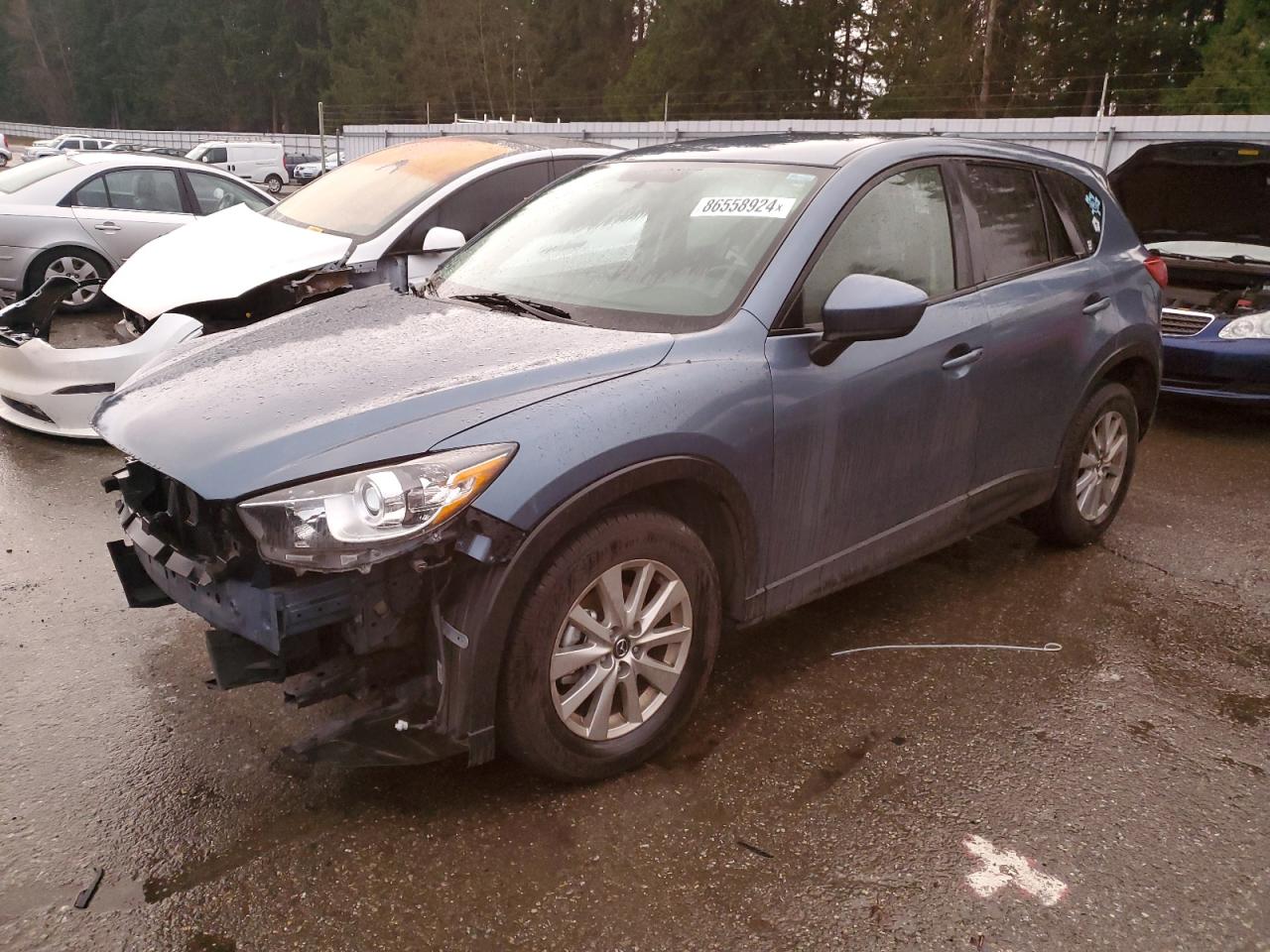 2015 Mazda Cx-5 Touring VIN: JM3KE4CY4F0431007 Lot: 86558924