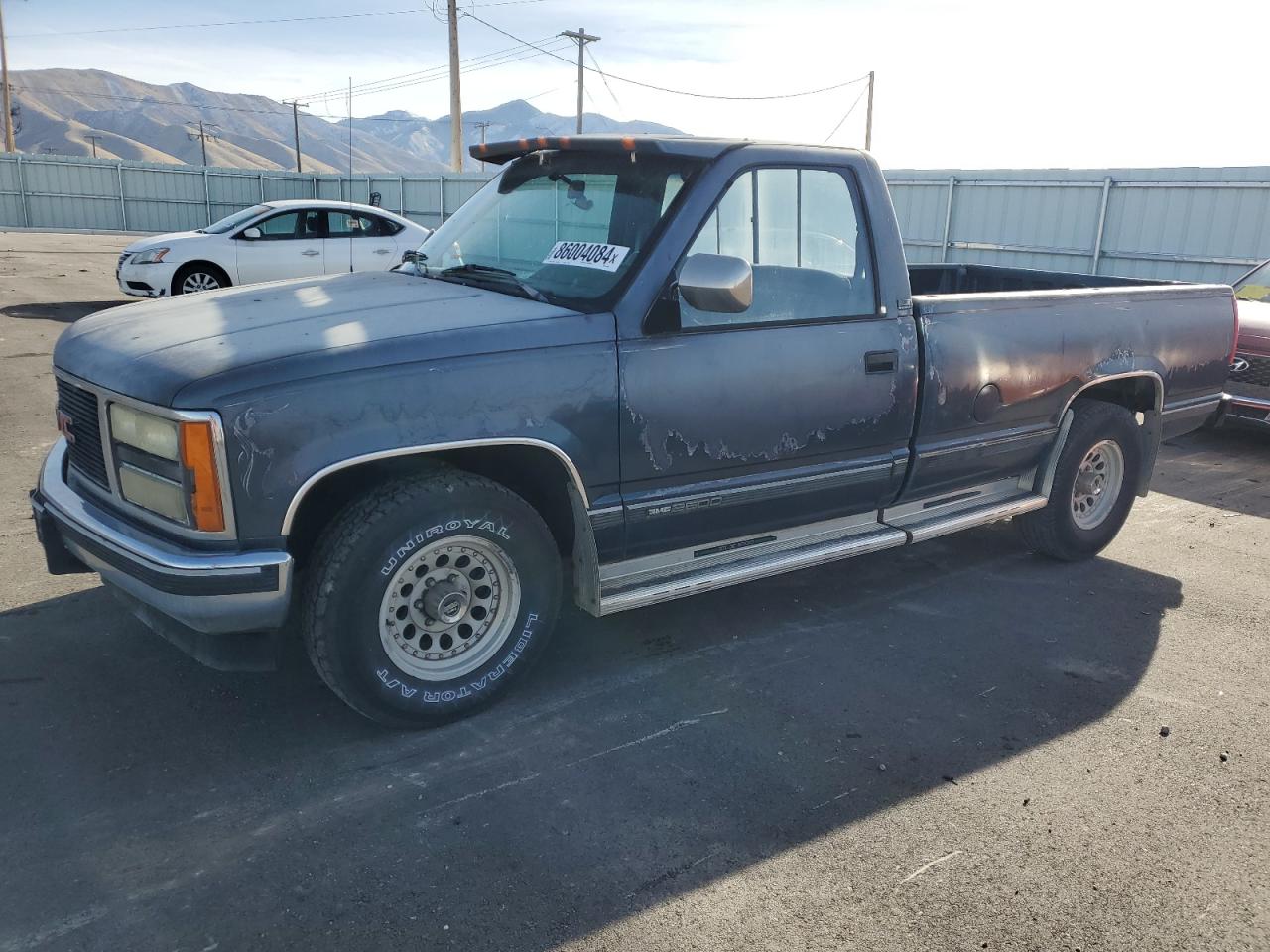 1990 GMC Sierra C2500 VIN: 1GTFC24K2LE554012 Lot: 86004084