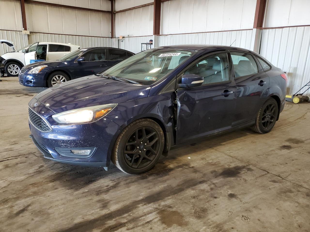 2016 Ford Focus Se VIN: 1FADP3F20GL248710 Lot: 86384244