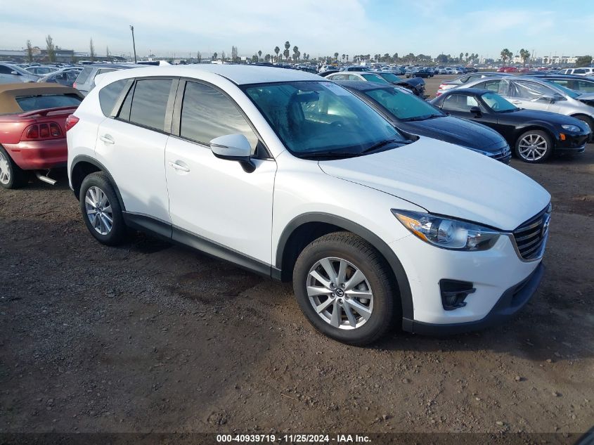 2016 Mazda Cx-5 Touring VIN: JM3KE2CY8G0879594 Lot: 40939719